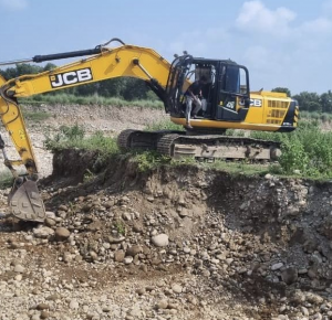 Machinery of NHAI contractor seized for illegal mining near bridge