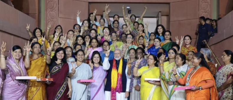 Women members chant PM’s name, present bouquet to him after historic passage of women’s quota Bill in Parliament