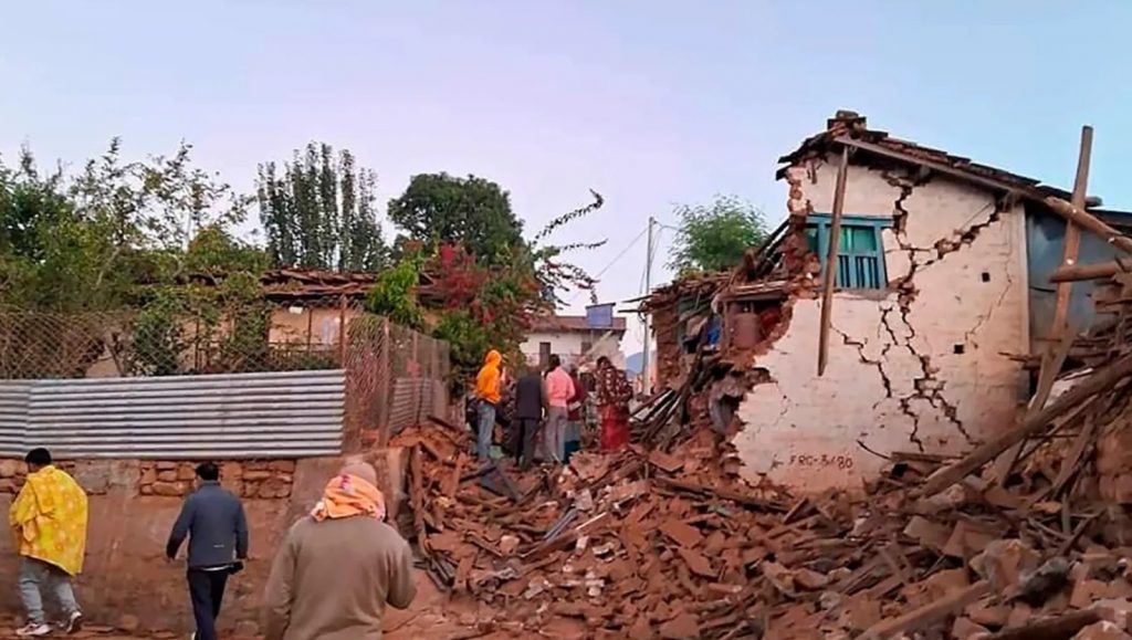 Thousands Spend Night Under Open Sky In Nepal After Earthquake damaged houses in Nepal