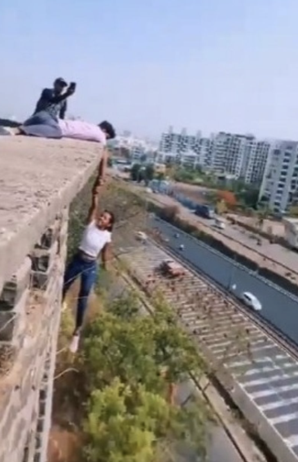 Girl dangles mid-air for reel, Pune Police nab 2 for daredevil stunt