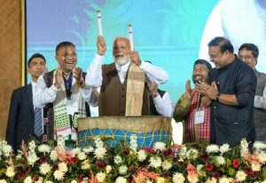 Prime Minister Narendra Modi beats traditional drum at 'Jhumoir Binandini' event in Assam