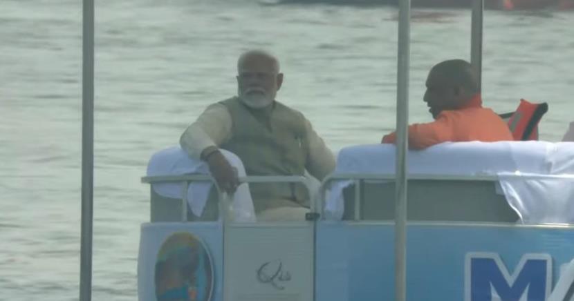 Prime Minister Narendra Modi arrives in Prayagraj to take holy dip at Sangam