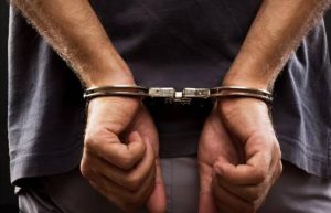 Two Held With TRF Posters During Naka Checking In Magam
