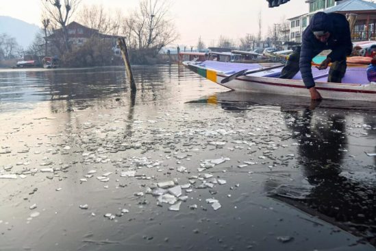 Parts of Dal Lake freezes as Kashmir reels under severe cold