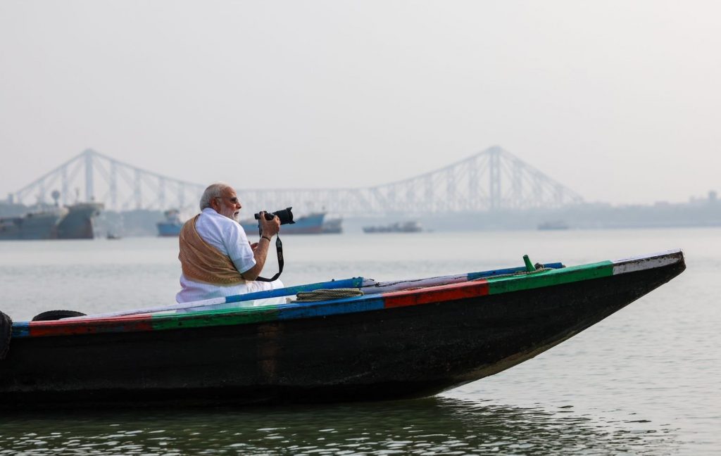 PM Takes Boat Ride On Hooghly River In Kolkata, Tries His Hand At Photographing