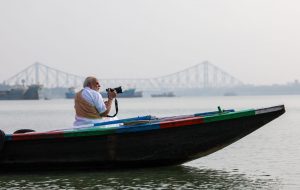 PM Takes Boat Ride On Hooghly River In Kolkata, Tries His Hand At Photographing