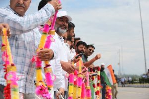 First Batch Of Amarnath Pilgrims Welcomed With Flower Petals In Kashmir
