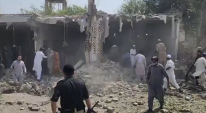 At least 16 people were killed and dozens injured in a powerful suicide blast during Friday prayers at a mosque near police lines in Kohat